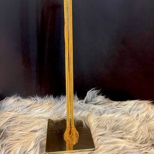 Multi strand gold tone fashion necklace